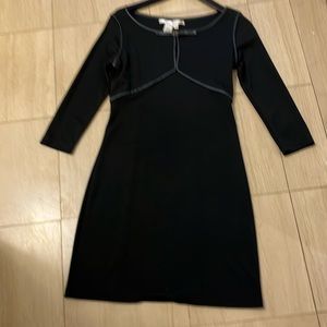 Sweet dress with nice trim and buckle in the front